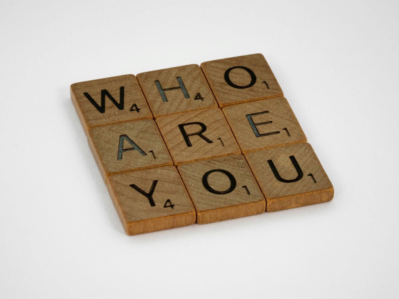 Scrabble tiles spelling - Who are you